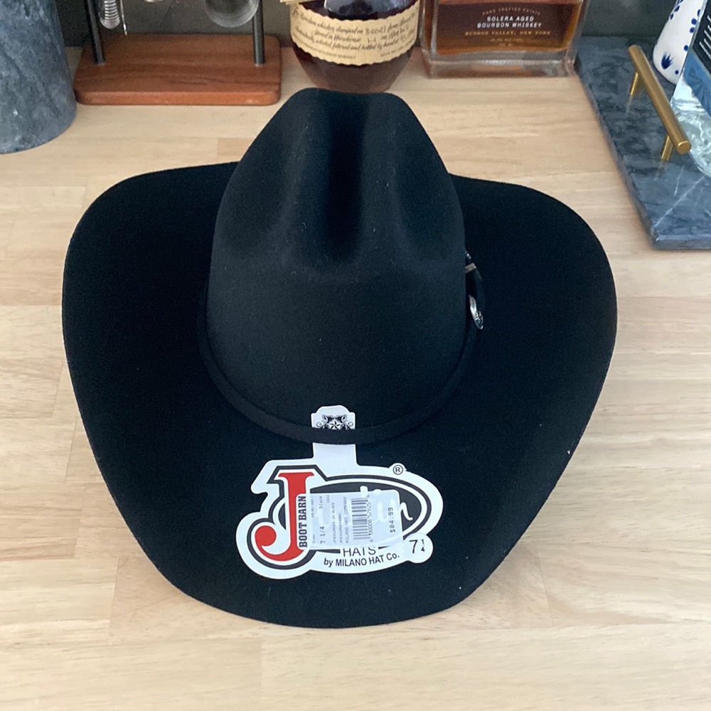 BRAND NEW JUSTIN WESTERN HAT. SIZE 7 1/4. NWT. COLOR: BLACK. 100% WOOL (3X).